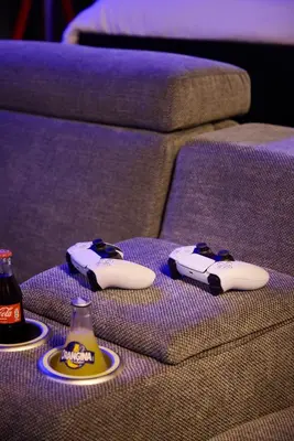 Coin salon dans l'établissement Appartement Cinéma Ecran géant & Dolby Atmos