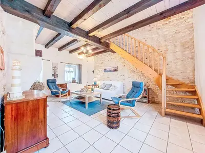 Coin salon dans l'établissement Holiday Home Ile d'Oléron by Interhome
