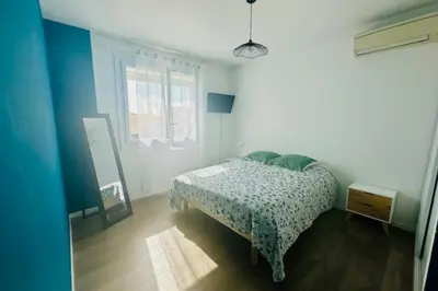 Un ou plusieurs lits dans un hébergement de l'établissement Maison lumineuse à Périgny confort jusquà 6 !