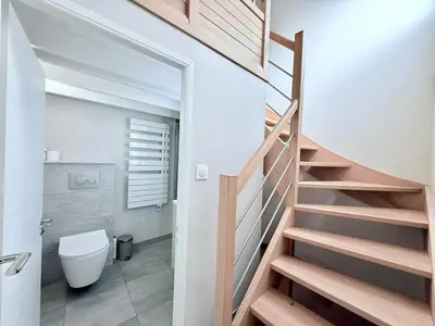 Salle de bains dans l'établissement Le Bord de Plage