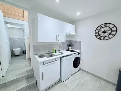 Cuisine ou kitchenette dans l'établissement Le Bord de Plage