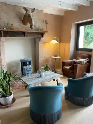 Coin salon dans l'établissement Maison a la campagne