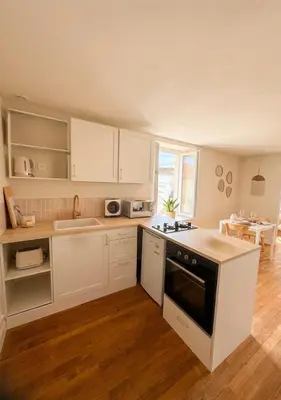 Cuisine ou kitchenette dans l'établissement Oasis proche du Futuroscope