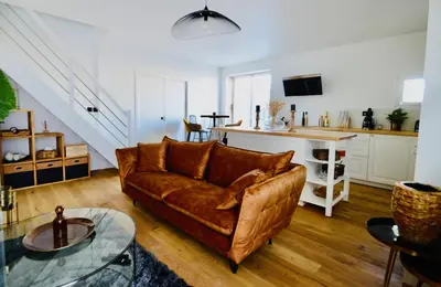 Coin salon dans l'établissement Maisonnette élégante