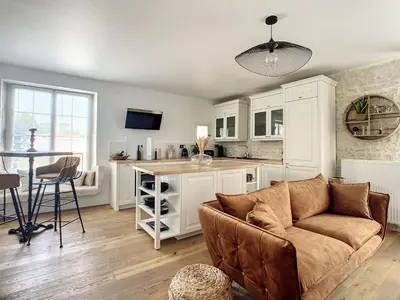 Cuisine ou kitchenette dans l'établissement Maisonnette élégante