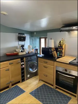 Cuisine ou kitchenette dans l'établissement T3 meublé Séjour pro famille hyper centre Niort