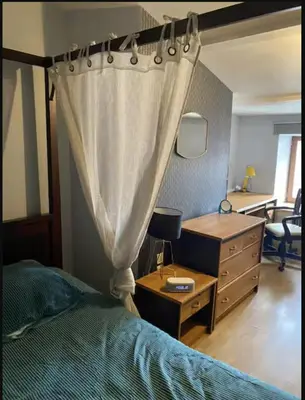 Un ou plusieurs lits dans un hébergement de l'établissement T3 meublé Séjour pro famille hyper centre Niort