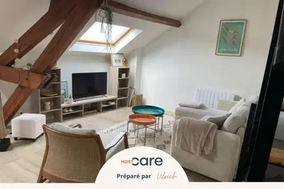 Télévision ou salle de divertissement dans l'établissement Le Nid-marin - plage et centre
