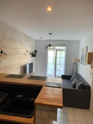 Coin salon dans l'établissement Appartement avec terrasse à 20 de la plage