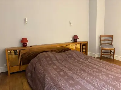 Un ou plusieurs lits dans un hébergement de l'établissement Mélusine - logement tout confort