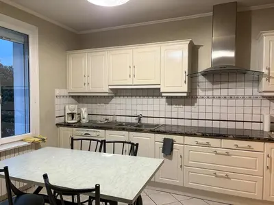 Cuisine ou kitchenette dans l'établissement Mélusine - logement tout confort