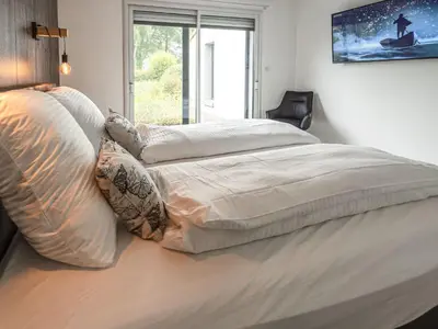 Un ou plusieurs lits dans un hébergement de l'établissement Holiday Home Villa DUXCAAR Merv- by Interhome