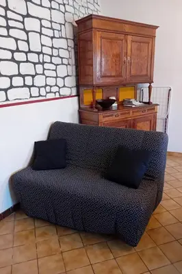 Coin salon dans l'établissement Holiday Home Steinhaus Ardenne in Fontenay-le-Comte by Interhome