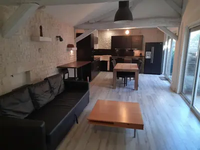 Coin salon dans l'établissement Holiday Home Haus La Rochelle by Interhome
