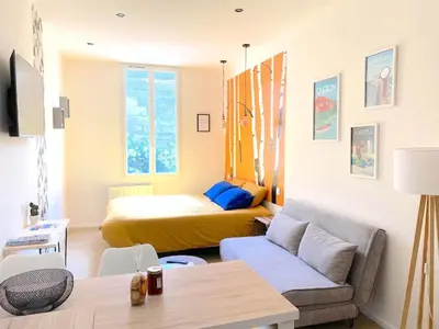 Un ou plusieurs lits dans un hébergement de l'établissement Apartment in Rochefort mit Garten und Terrasse by Interhome