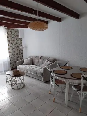 Coin salon dans l'établissement Maisonette Syl' -vie