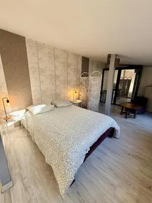 Un ou plusieurs lits dans un hébergement de l'établissement La Maison des Bains - Piscine intérieure privée