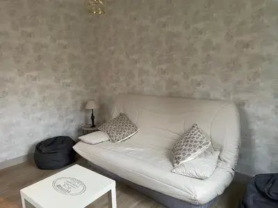 Coin salon dans l'établissement Gîte centre coulon - Le Héron