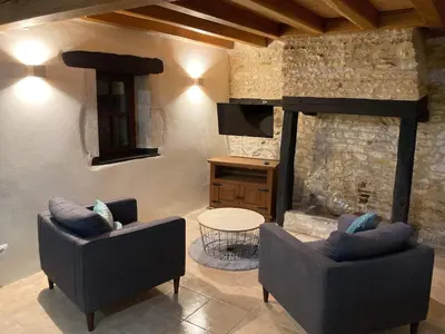 Coin salon dans l'établissement La maisonnette de la venelle