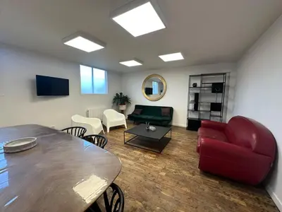 Télévision ou salle de divertissement dans l'établissement Le Lido Maison 6 personnes