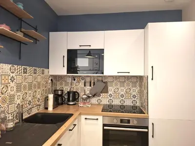 Cuisine ou kitchenette dans l'établissement Appartement sur la plage