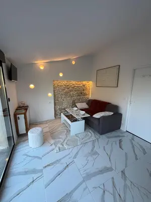 Coin salon dans l'établissement La Suite du Maine SAINTES
