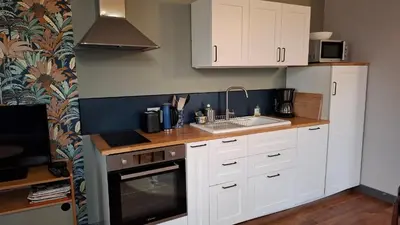 Cuisine ou kitchenette dans l'établissement Gite de charme, proche du futuroscope