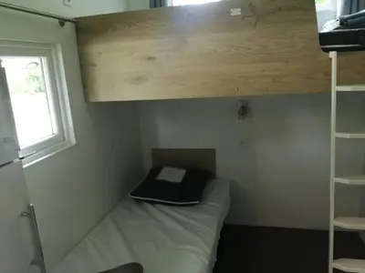 Un ou plusieurs lits dans un hébergement de l'établissement Camping 3 étoiles - Piscine - ccbfa0c