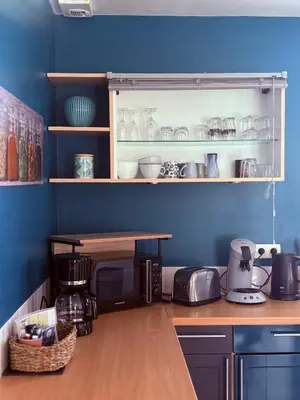 Cuisine ou kitchenette dans l'établissement Aux Portes de La Roussille
