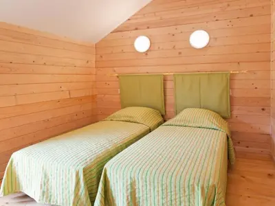 Un ou plusieurs lits dans un hébergement de l'établissement Chalet avec Terrasse - 4 personnes, Cuisine équipée - API-1-52-1335