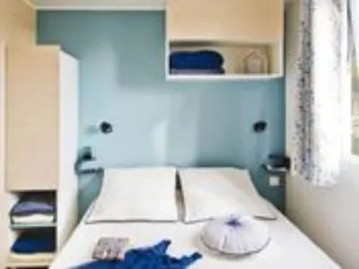 Un ou plusieurs lits dans un hébergement de l'établissement Mobil Home 4 pers - Terrasse - API-1-52-1635