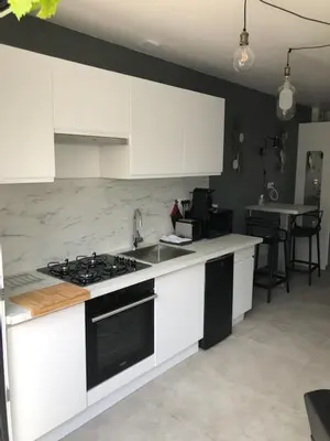 Cuisine ou kitchenette dans l'établissement Le logis de Niort appart hôtel bis
