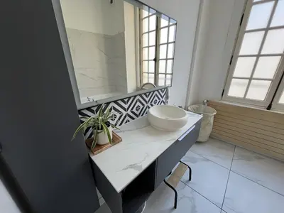 Coin salon dans l'établissement Maison en face du Marche Notre-Dame