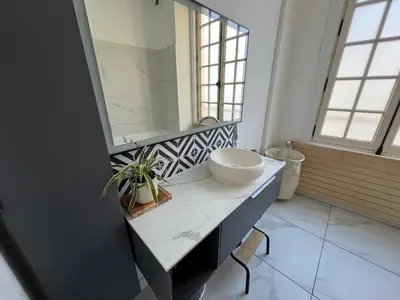 Coin salon dans l'établissement Maison en face du Marche Notre-Dame