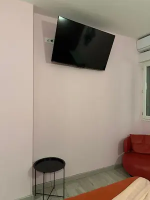 Télévision ou salle de divertissement dans l'établissement La TOUR DE SAINT XANDRE LA ROCHELLE