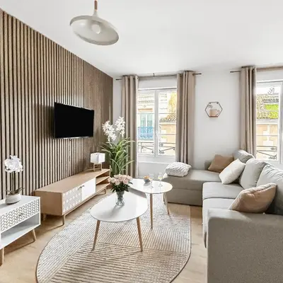 Télévision ou salle de divertissement dans l'établissement Appartement moderne et lumineux en centre-ville