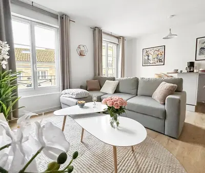 Coin salon dans l'établissement Appartement moderne et lumineux en centre-ville