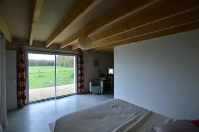 Un ou plusieurs lits dans un hébergement de l'établissement Chambre d'hôtes La Folie