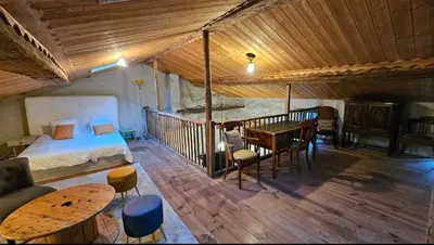Un ou plusieurs lits dans un hébergement de l'établissement Ancien moulin dans un cadre idyllique