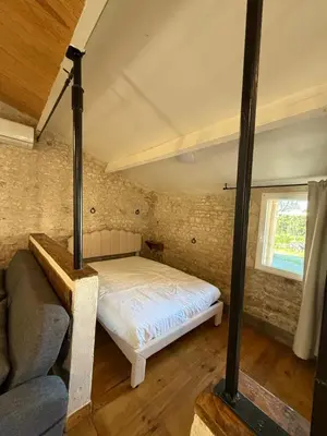 Un ou plusieurs lits dans un hébergement de l'établissement Maison en pierres, calme et authenticité vendéenne