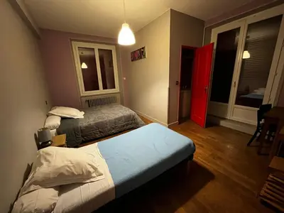 Un ou plusieurs lits dans un hébergement de l'établissement La Barrière