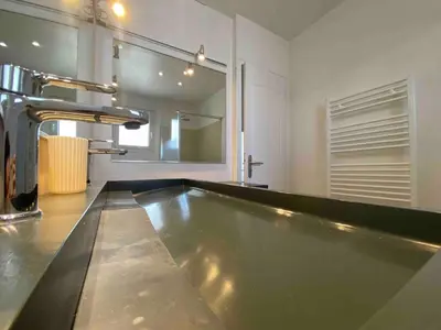 Cuisine ou kitchenette dans l'établissement La Jarnacaise