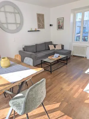Coin salon dans l'établissement Maison cosy 3 chambres - Quartier des Dunes
