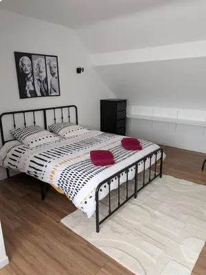 Un ou plusieurs lits dans un hébergement de l'établissement Maison cosy 3 chambres - Quartier des Dunes