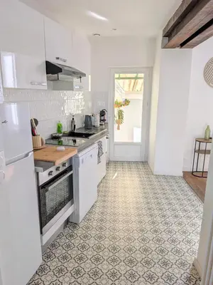 Cuisine ou kitchenette dans l'établissement Maison cosy 3 chambres - Quartier des Dunes