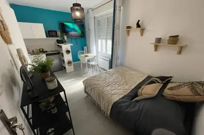 Un ou plusieurs lits dans un hébergement de l'établissement Le Sano - centre ville - wifi
