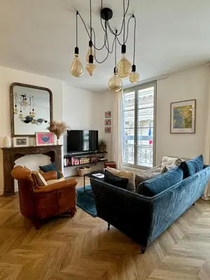 Télévision ou salle de divertissement dans l'établissement Appartement de Charme T3 Hyper centre Rochelais