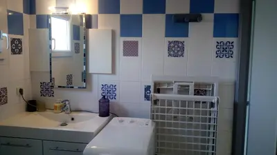 Salle de bains dans l'établissement Les Clés Nature Apt 44