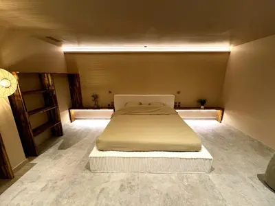 Un ou plusieurs lits dans un hébergement de l'établissement ExSPArience Private Spa Suite