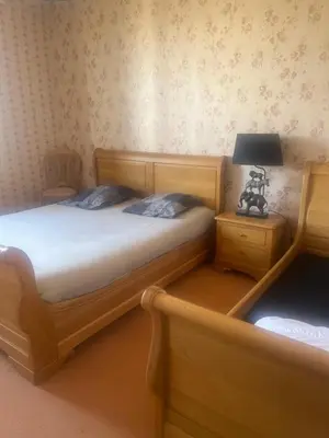 Un ou plusieurs lits dans un hébergement de l'établissement Maison en pierre